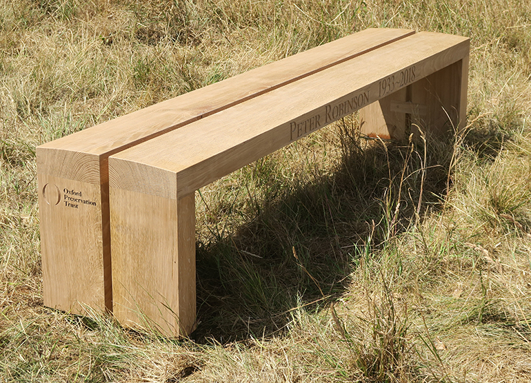 northways bench with carved text